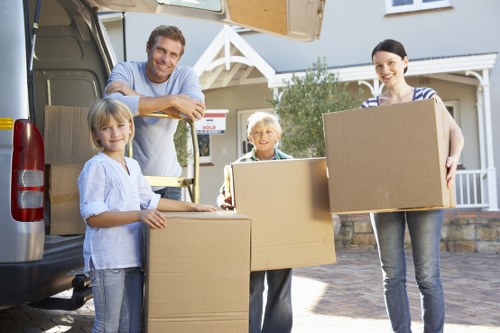 Commercial moving team handling office furniture near Colindale