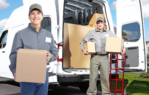 Local business removals team handling access and loading in Colindale