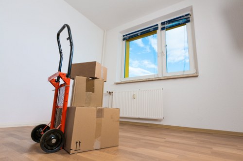 Packed boxes and furniture ready for transport in Colindale