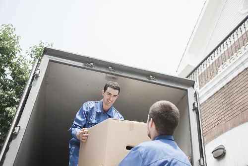 Furniture being loaded into a removal van in Colindale